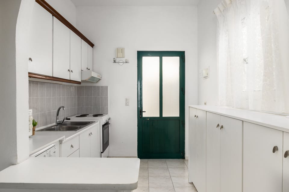 Villa | Private kitchen | Fridge, microwave, oven, stovetop