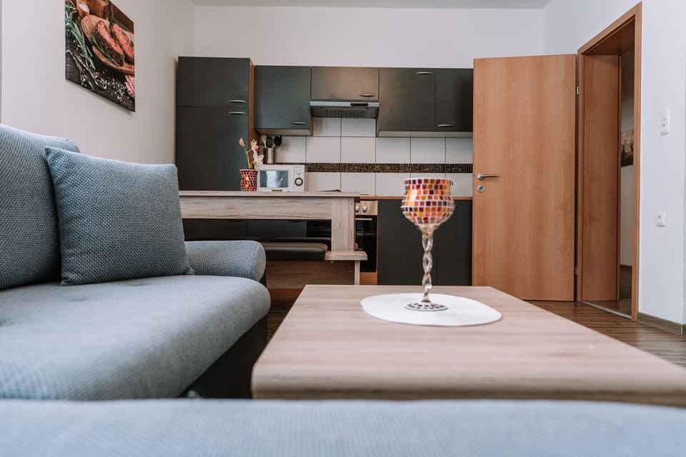 Economy Apartment | Living area | 60-inch flat-screen TV with cable channels