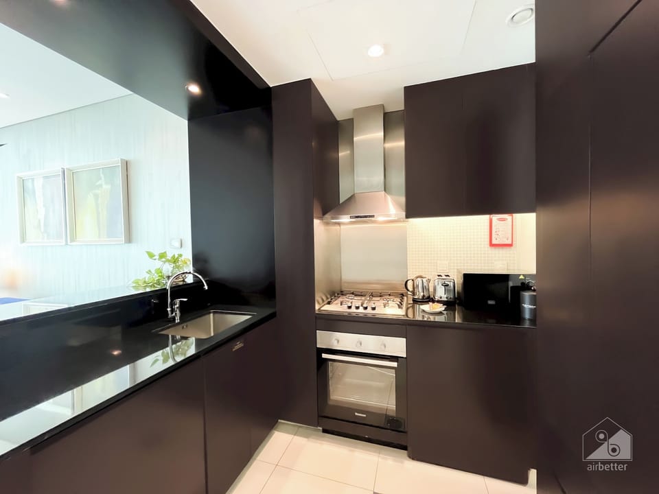 Apartment (1 Bedroom) | Private kitchen | Microwave, oven, stovetop, dishwasher