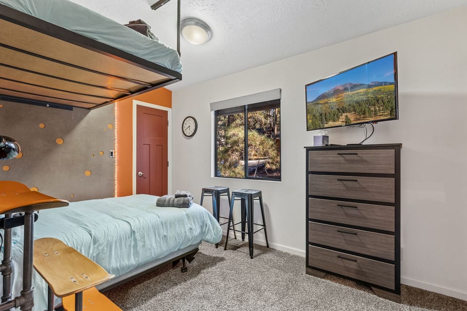 Guest bedroom has 2 full sized beds with smart TV
