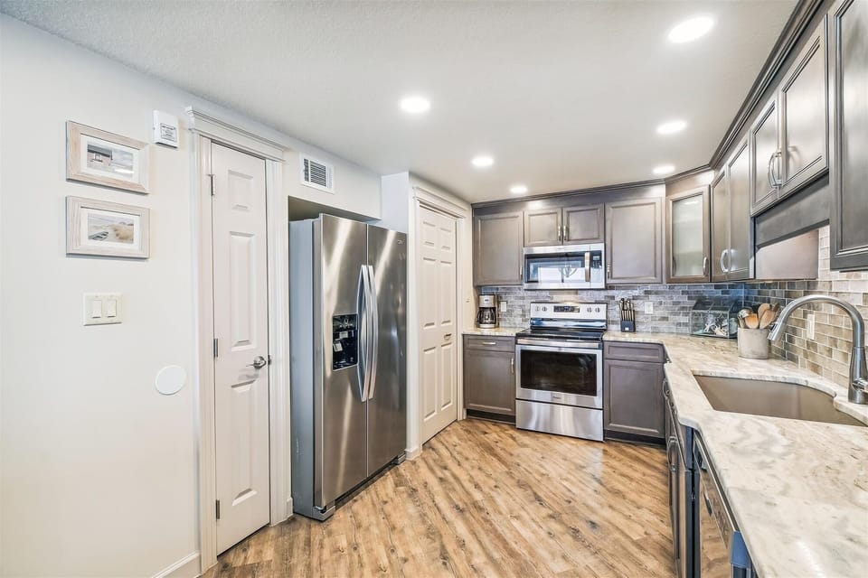 Condo, 2 Bedrooms | Private kitchen | Fridge, oven, coffee/tea maker, toaster
