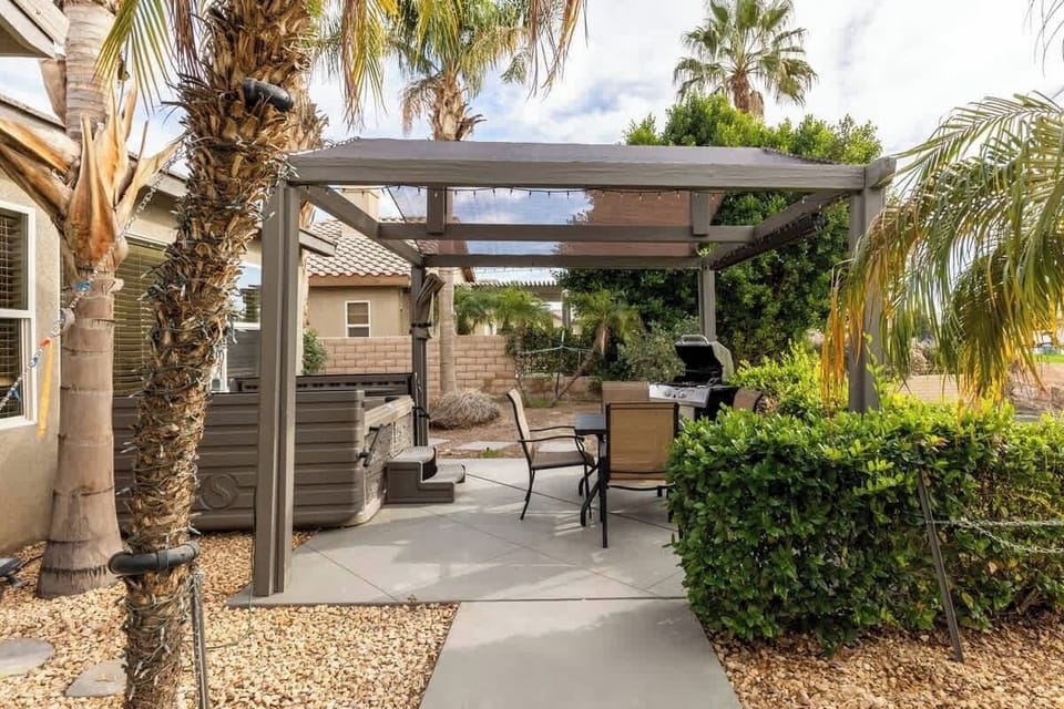Plunge and relax in the hot tub or enjoy your barbeque with an enchanting pond view in the backyard