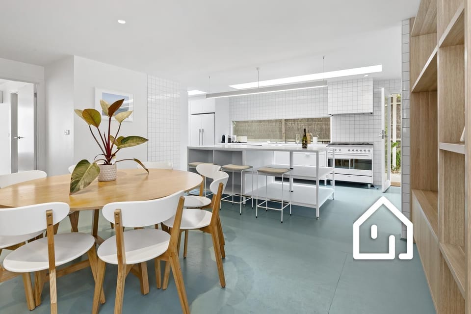 Indoor dining setting for 8 with additional seating at the breakfast bar for 3