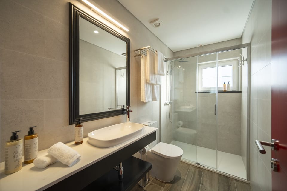 Shower, free toiletries, hair dryer, bathrobes