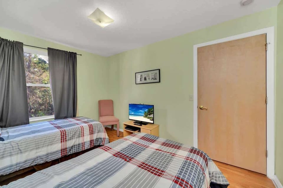 Comfortable Twin Bedroom Perfect for Kids or Guests