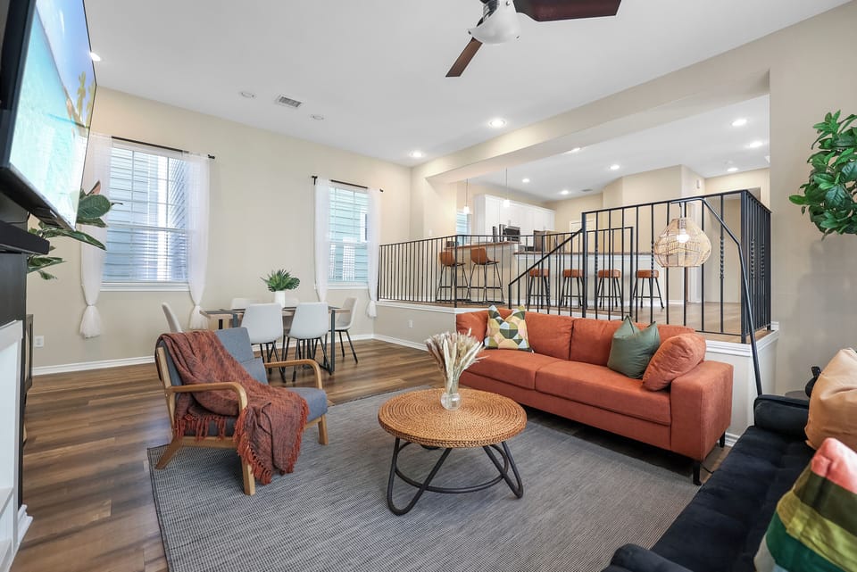 A modern twist to the split-level living area creates an open and airy space. 
