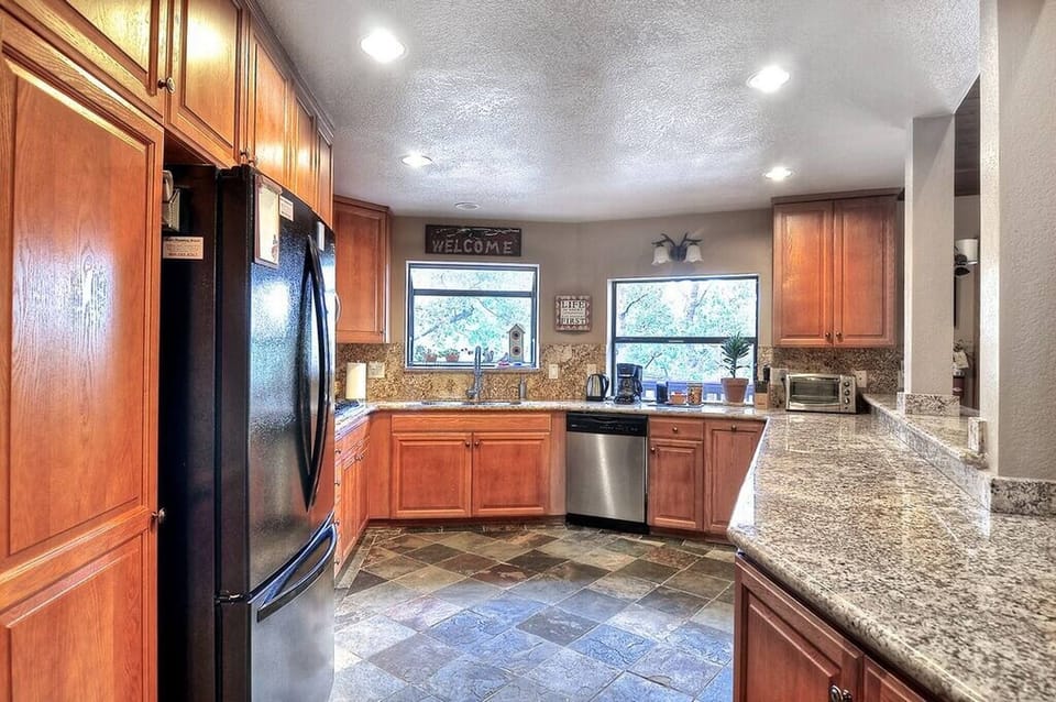 Expansive Upstairs Kitchen! Perfect for cooking and feeding several families!