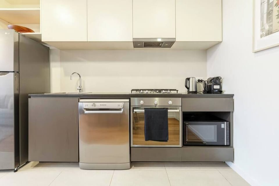 Cook your favorite meals in this fully - equipped kitchen..