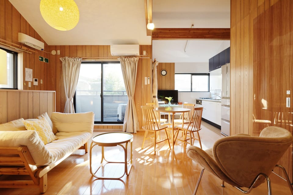 Design Cottage, 2 Bedrooms, 2 Bathrooms, Annex Building | Living area | 42-inch LCD TV with digital channels, iPod dock