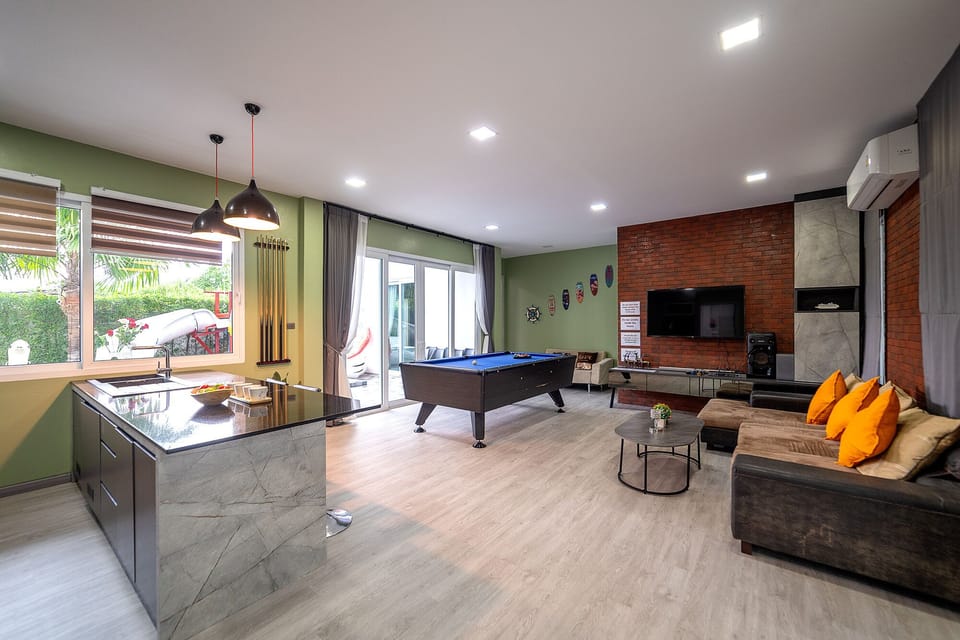 Exclusive Villa, 5 Bedrooms | Living area | Flat-screen TV