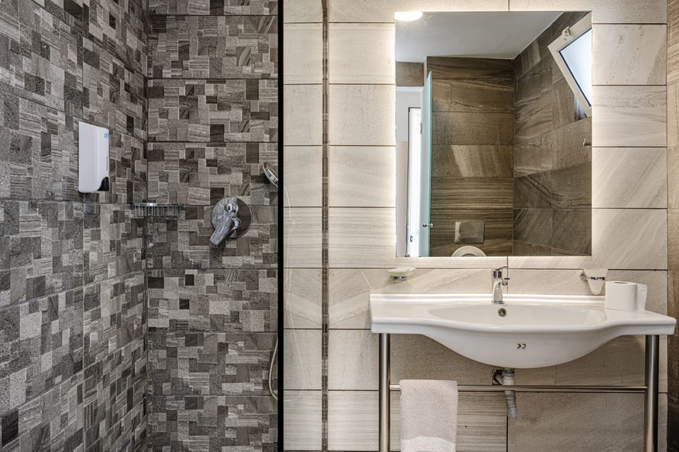 Family Apartment | Bathroom | Hair dryer, towels