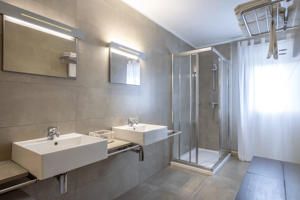 Exclusive Double Room, 1 King Bed, Terrace, City View | Bathroom | Shower, hair dryer, soap, shampoo