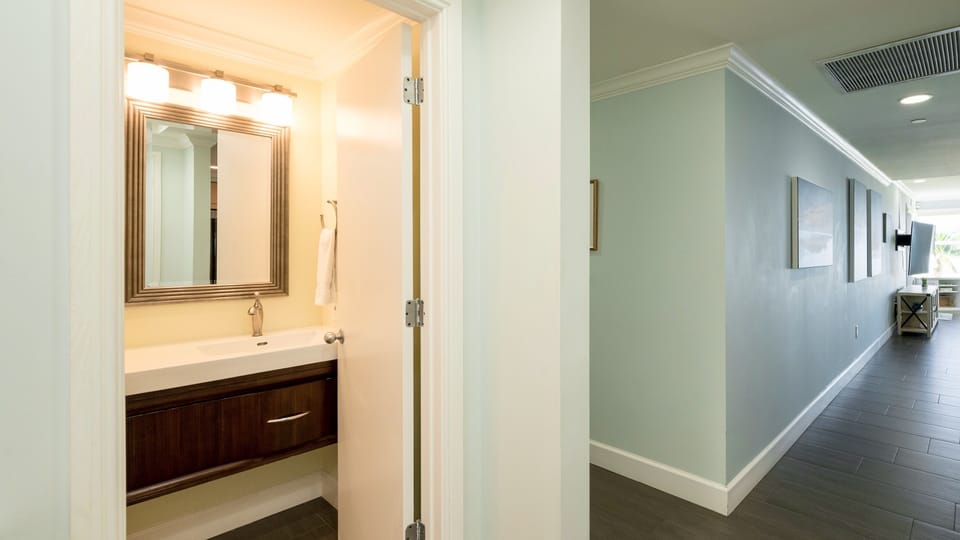 The powder room is located near the entrance...