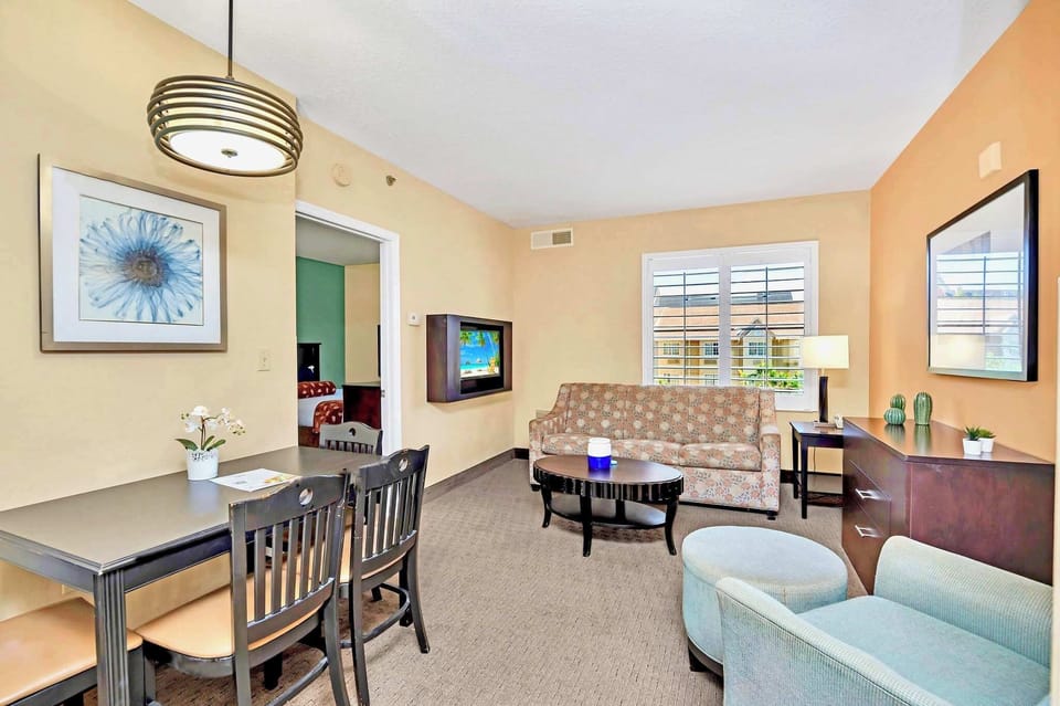 Bright Living And Dining Space With Ample Seating For Guests
