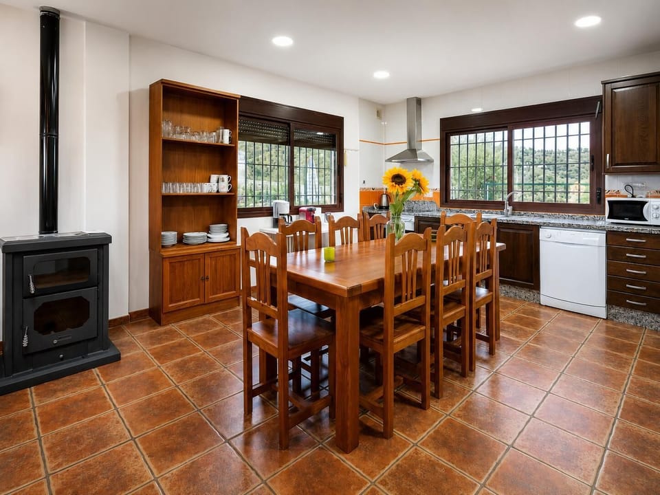 Open-plan living room with sofas, dining area