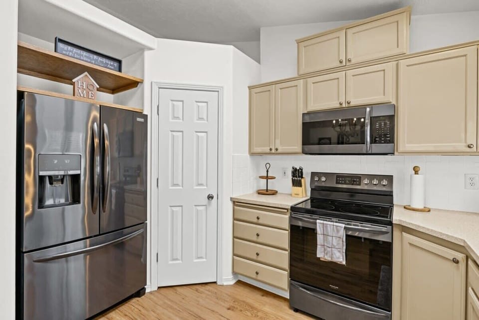 The kitchen is equipped with all cooking essentials and stainless steal appliances.