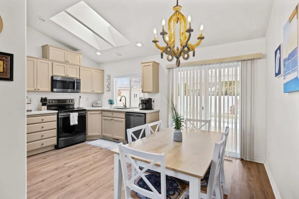 The open kitchen is flooded with natural light from the skylights and has everything you need to whip up a great meal.  Unless of course you plan at eating out at any of the great local eateries.