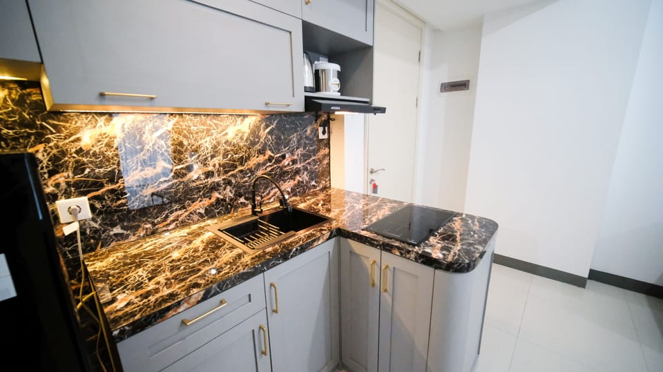 Apartment | Private kitchen | Full-size fridge, stovetop
