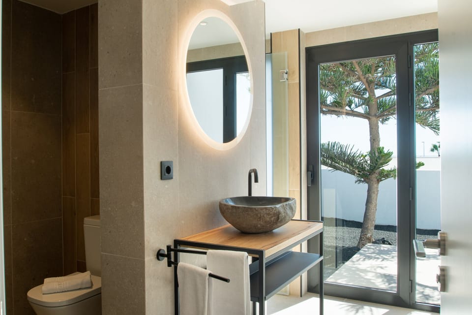 Feel like you are in a private spa with natural stone details and exclusive design.