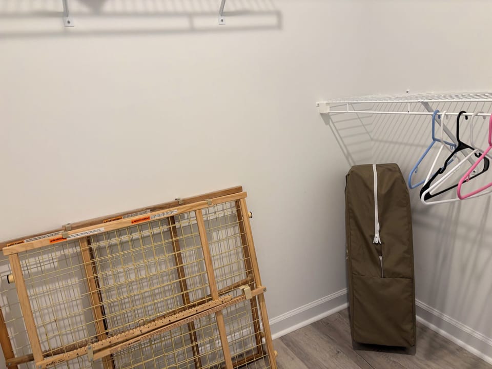 2 baby gates and a pack n play in main closet... all you need is a sheet!