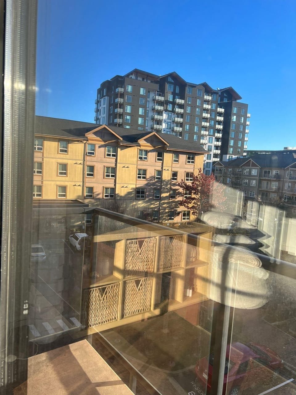 Scenic private balcony view looking over downtown Langford and surrounding mountains.