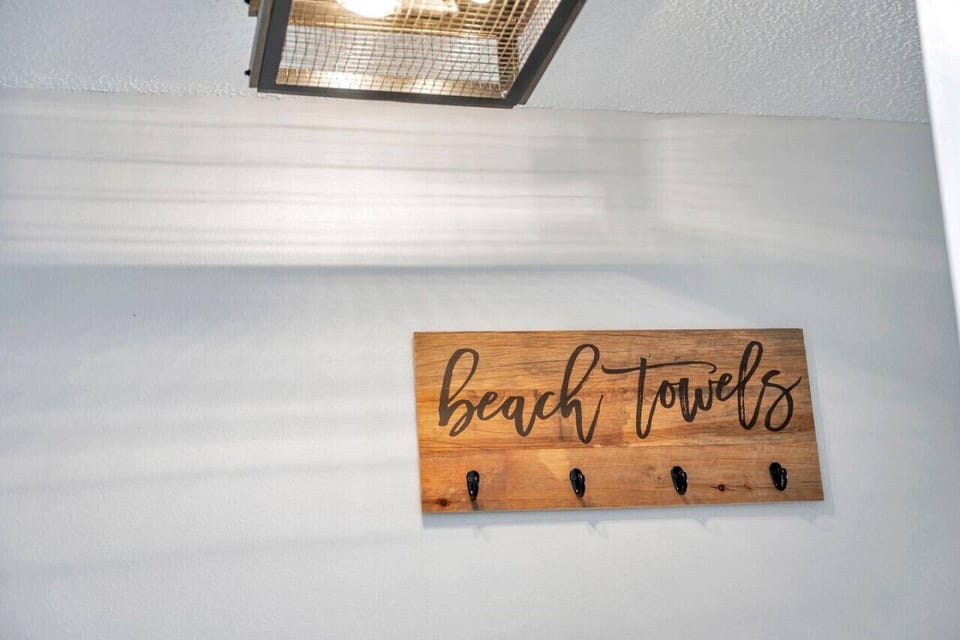 Charming coastal sign adds a warm, personal touch to the space.