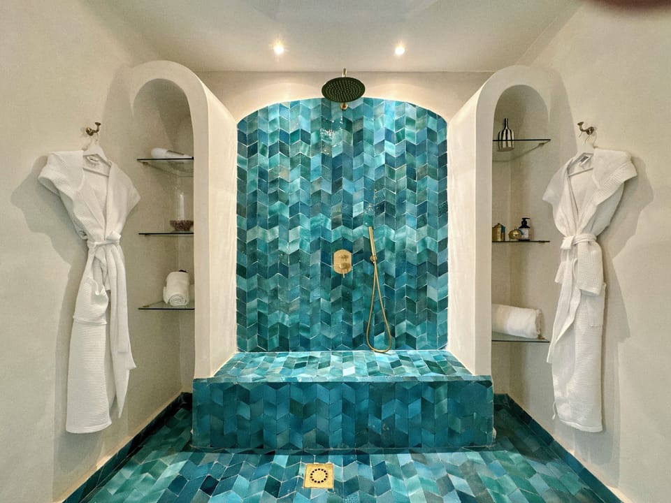 Luxury Suite, 1 Queen Bed | Bathroom | Deep soaking tub, rainfall showerhead, designer toiletries, hair dryer