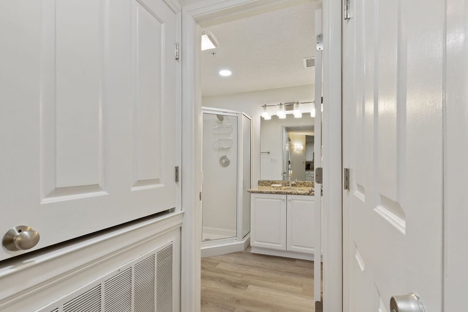 Second full guest bath with walk-in shower, sink and toilet. 