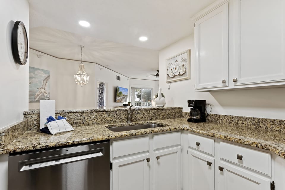 The kitchen has a new dishwasher, water heater, washer/dryer/garbage disposal.
