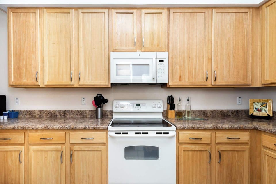 Condo, Multiple Beds, Balcony, Garden View (Sunset Serenity at Caribe Cove Resort) | Private kitchen | Fridge, microwave, oven, stovetop