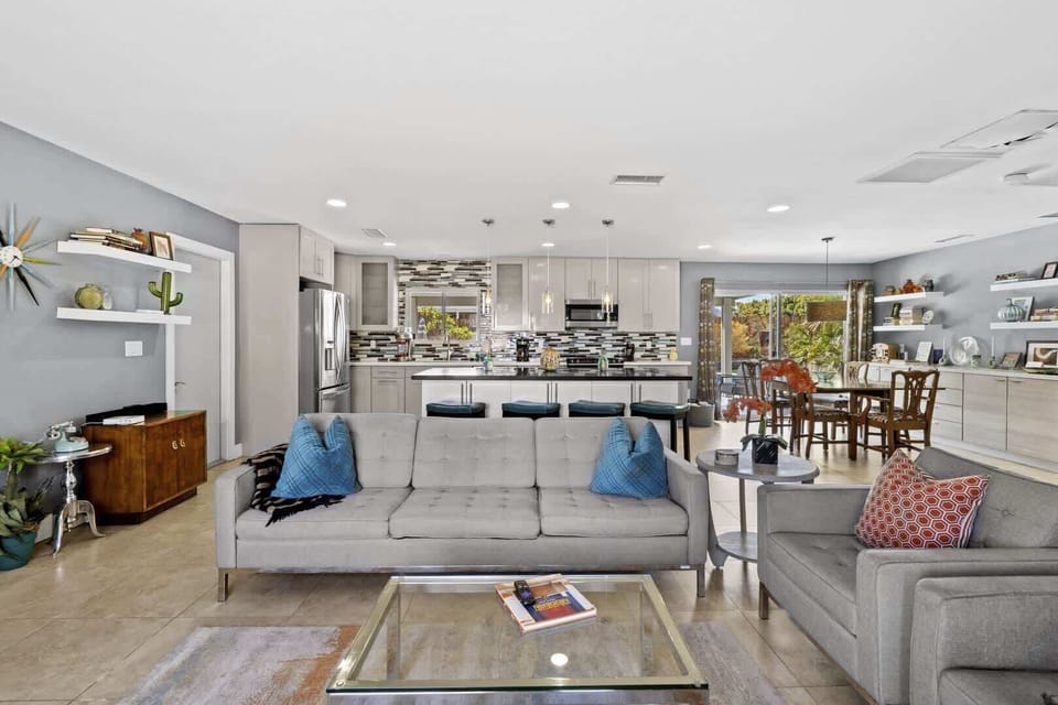 House, Multiple Beds, Pool Access, Pool View (Tiki Time Getaway) | Living area | 50-inch flat-screen TV with digital channels, fireplace