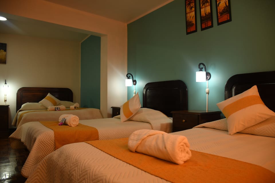 Standard Quadruple Room | Down comforters, desk, laptop workspace, WiFi (free)