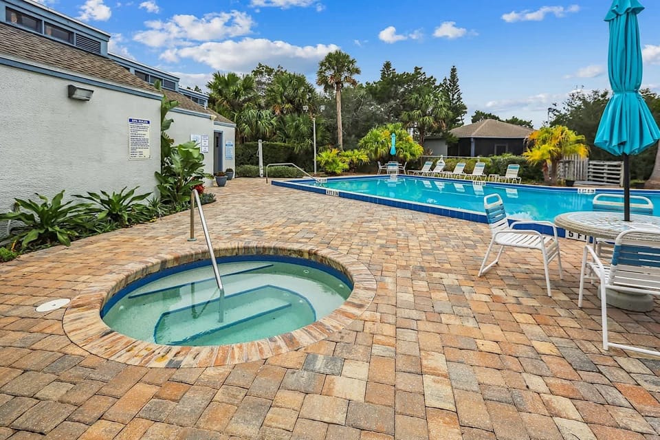 - Relaxing hot tub beside pool perfect for soothing and unwinding  
- Warm bubbling waters offer comfort after long beach adventures  
- A cozy retreat where fun relaxation and comfort come together  
