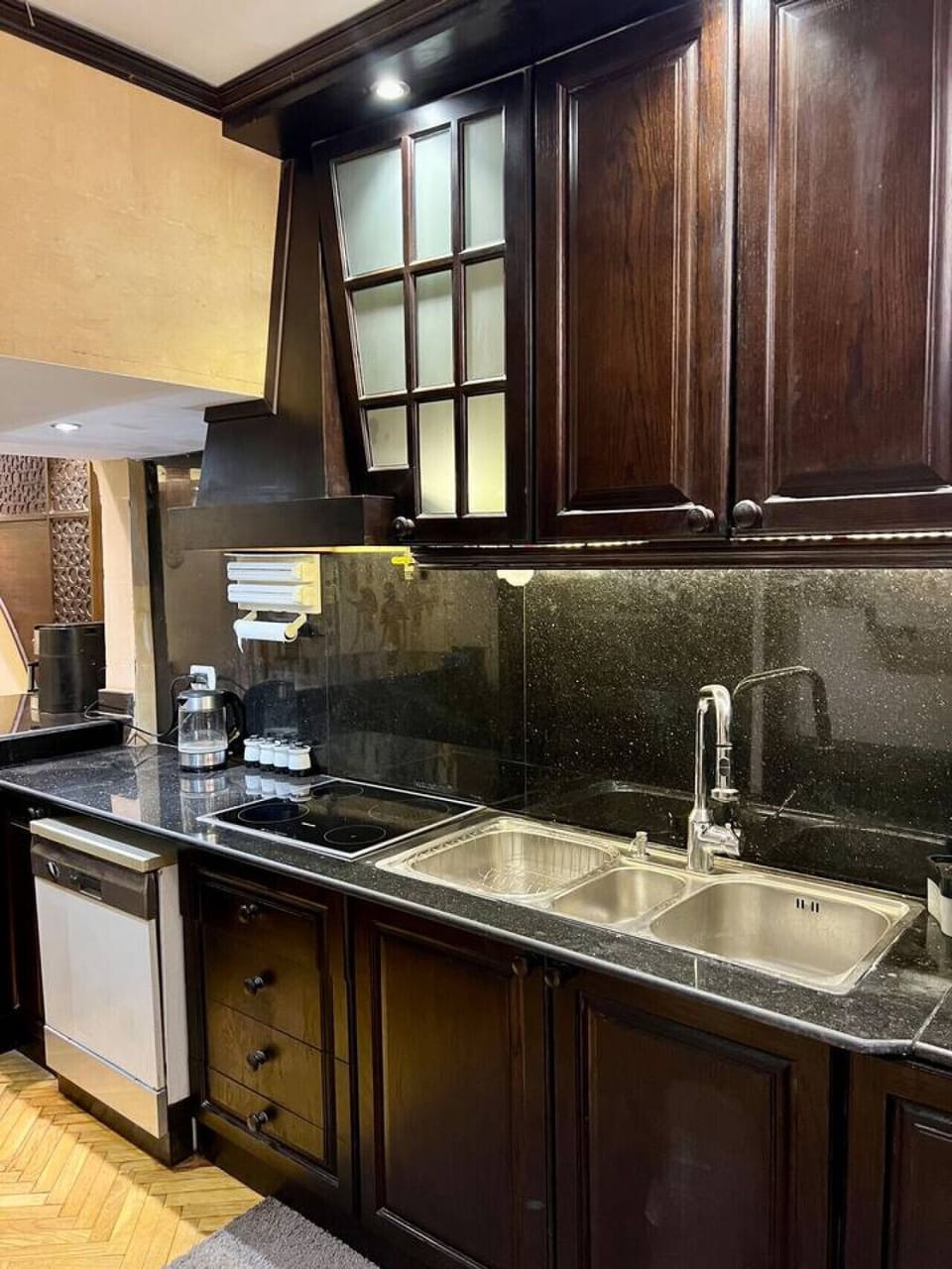 Unleash your inner chef in our fully-equipped kitchen, complete with sleek granite countertops and modern appliances, ensuring a delightful cooking experience.