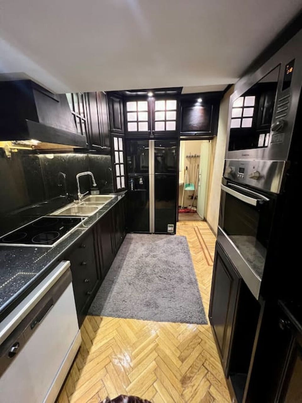 Unleash your inner chef in our fully-equipped kitchen, complete with sleek granite countertops and modern appliances, ensuring a delightful cooking experience.