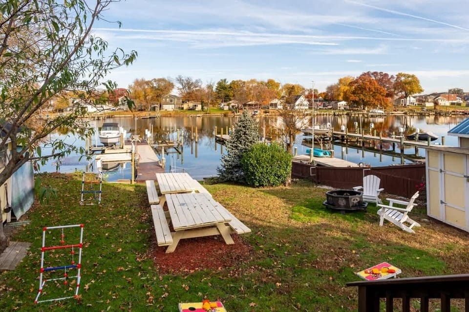 We have ladder ball and corn hole games to play in the backyard, two large picnic tables for outdoor dining and a fire pit with 6 adirondack chairs (not all shown) to enjoy on cool evenings.