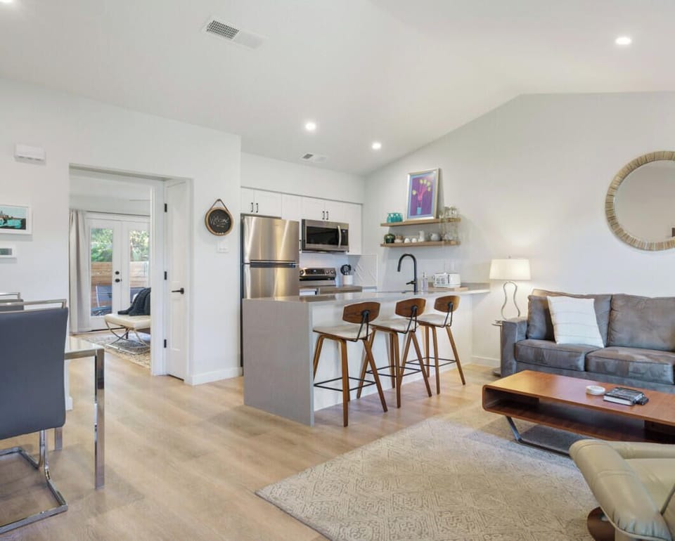 Spacious living area with a sleeper sofa and extra linens