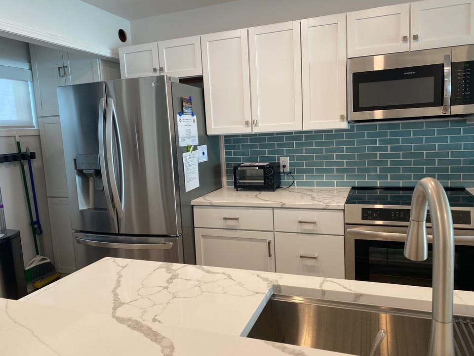 Wonderful kitchen w granite counters, Induction range, Kerig, crock pot, etc...