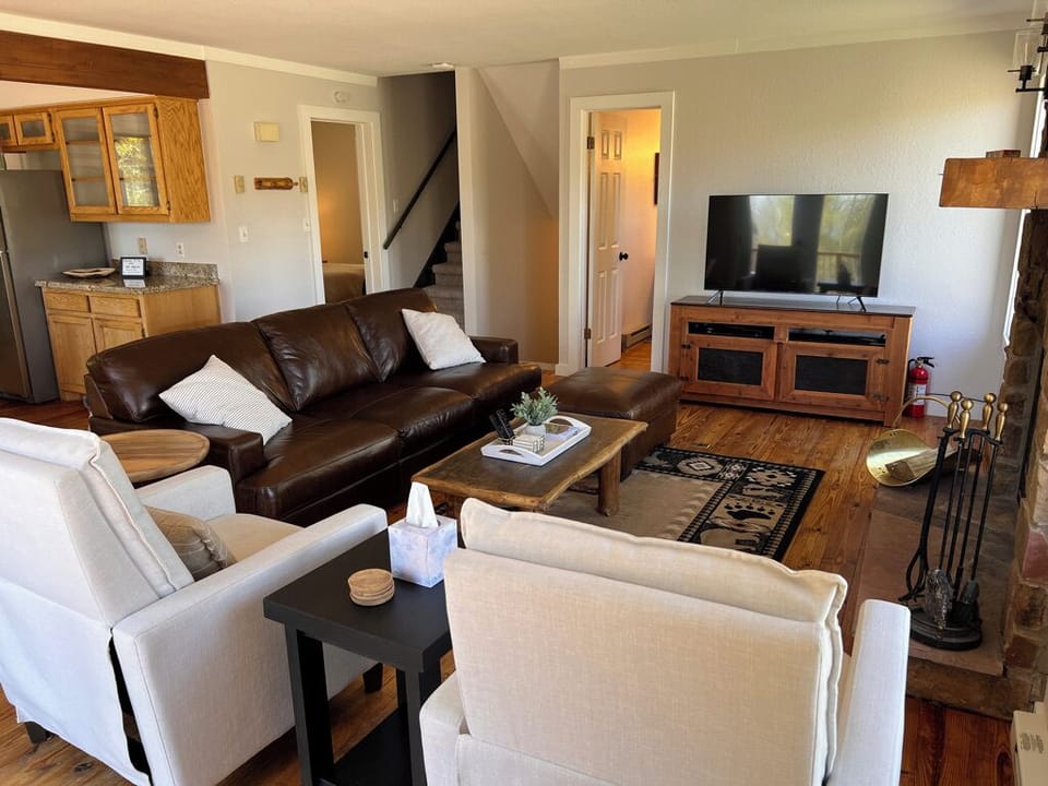 Living area. Large couch + 2 reclining chairs