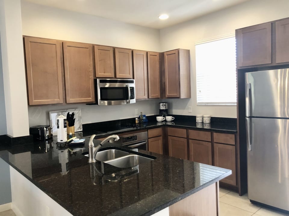 Kitchen with solid surface countertops for easy cleaning
