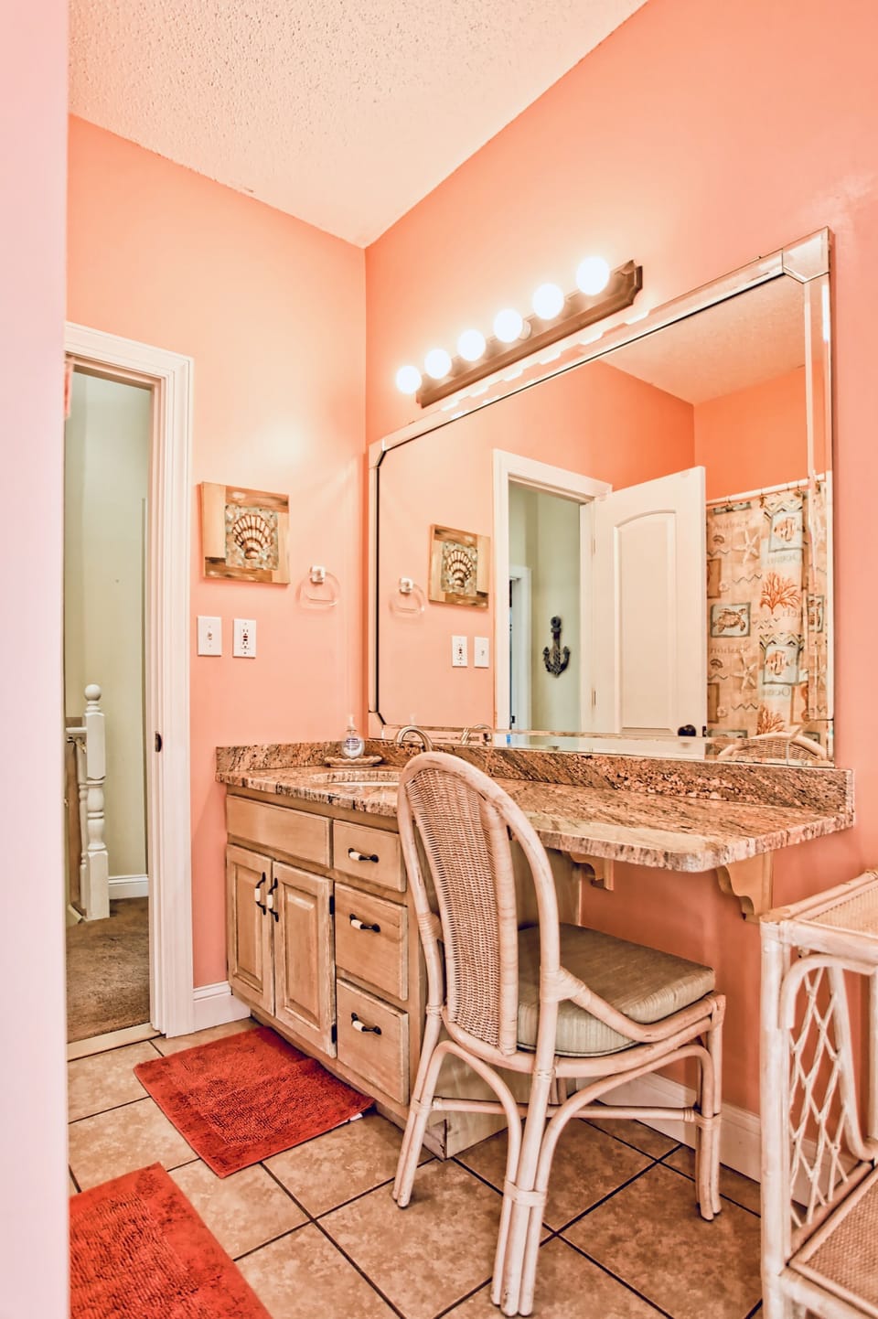 Bathroom 2 upstairs has full size tub/shower and vanity 