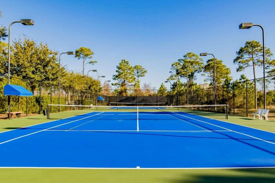 Play tennis/ pickleball on community tennis court (w/ pickleball lane markings)
