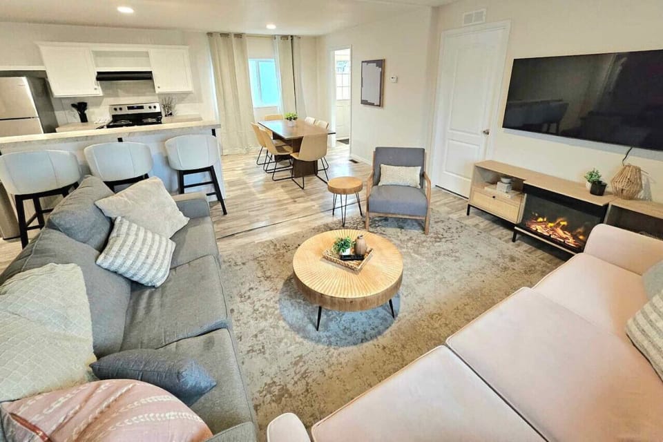 Open-concept living, dining, and kitchen areas perfect for gathering and relaxation