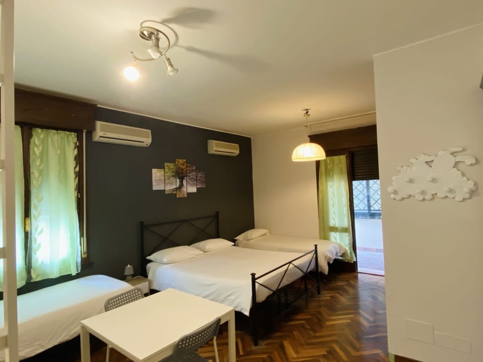 Deluxe Quadruple Room | Hypo-allergenic bedding, desk, free WiFi