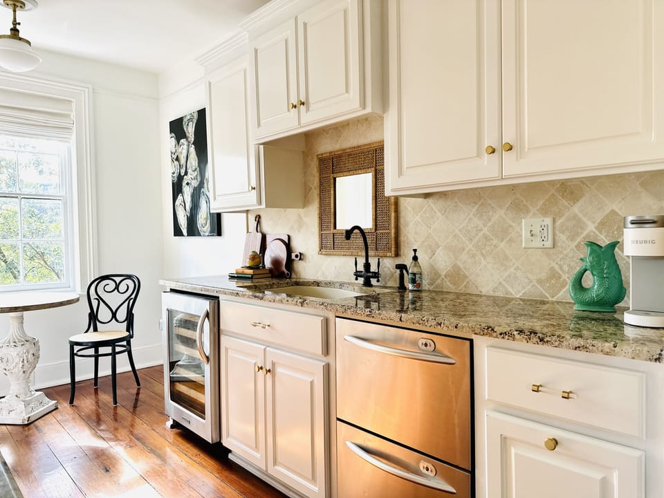 Refrigerator, freezer, oven, stove, wine cooler, disposal, and Bosh dishwasher.