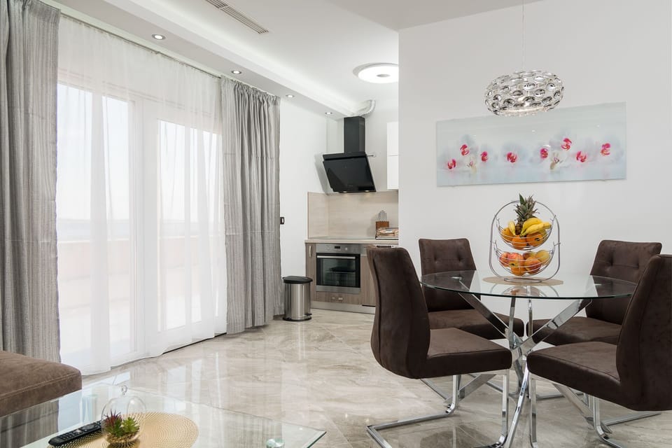 Villa | Living area | 80-cm LCD TV with cable channels
