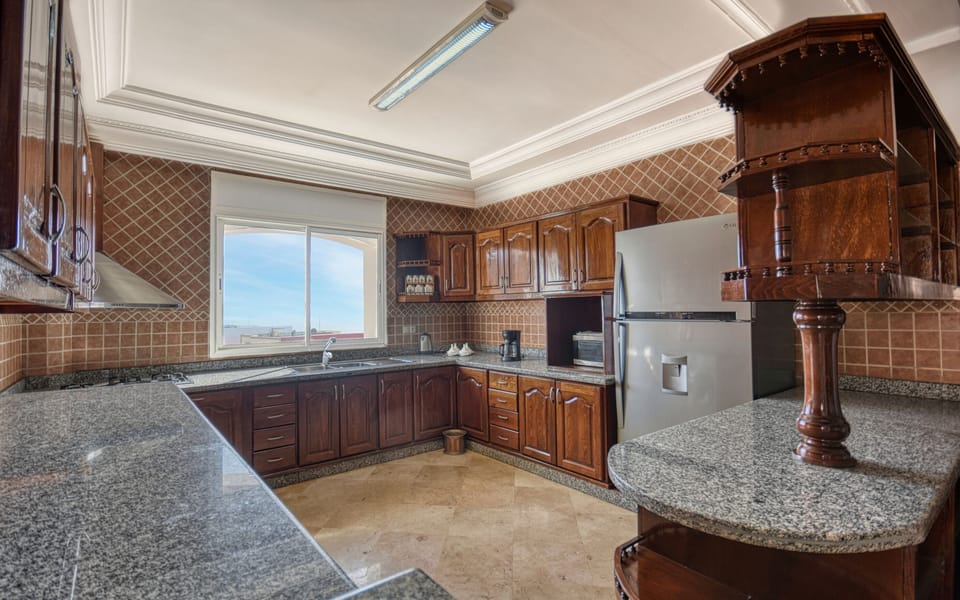 Apartment, Ensuite, Sea View | Private kitchen | Highchair