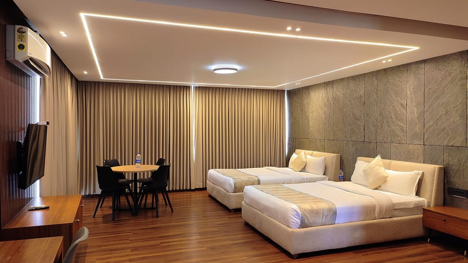 Royal Twin Room, 2 Queen Beds | Desk, laptop workspace, free WiFi, bed sheets