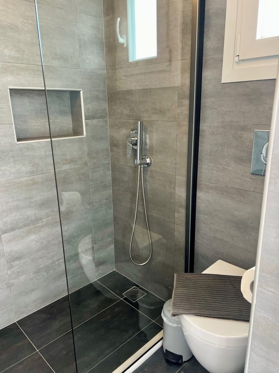 Vougli View 6 | Bathroom | Shower, rainfall showerhead, hair dryer, towels