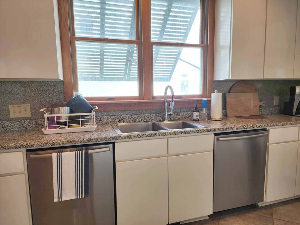 Kitchen has 2 Dishwashers